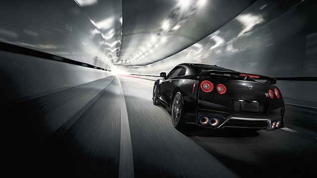 2023 Nissan GT-R seen from behind driving through a tunnel | Friendship Nissan of Boone in Boone NC